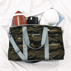 Camouflage bag with 'Jackson' branding on a white background