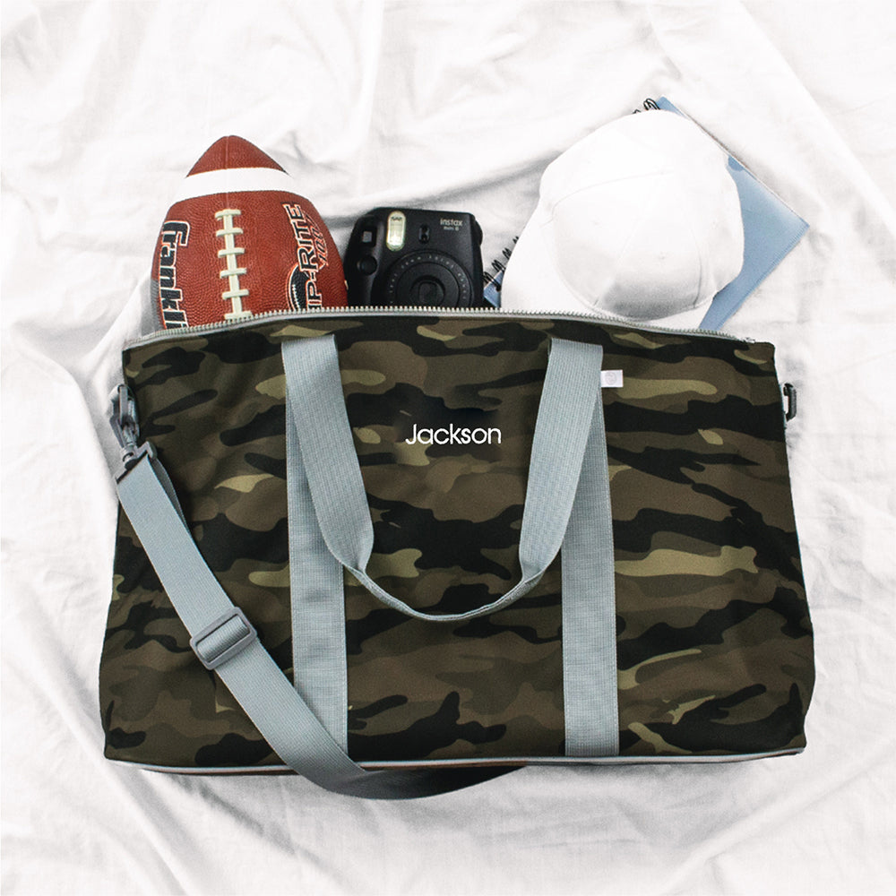 Camouflage bag with 'Jackson' branding on a white background