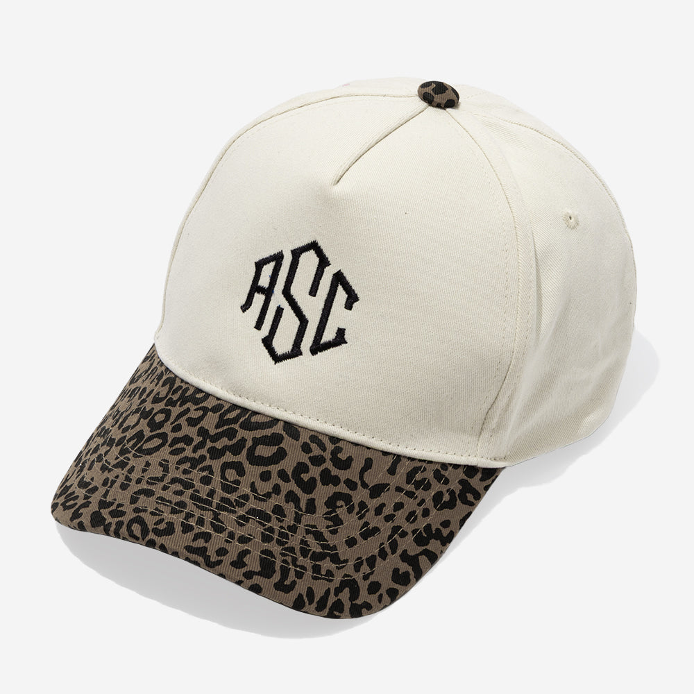 monogrammed leopard trucker hat in leopard print