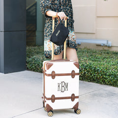 monogrammed lightweight wristlet in black with luggage 