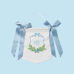 Decorative baby banner with blue ribbons on a light blue background