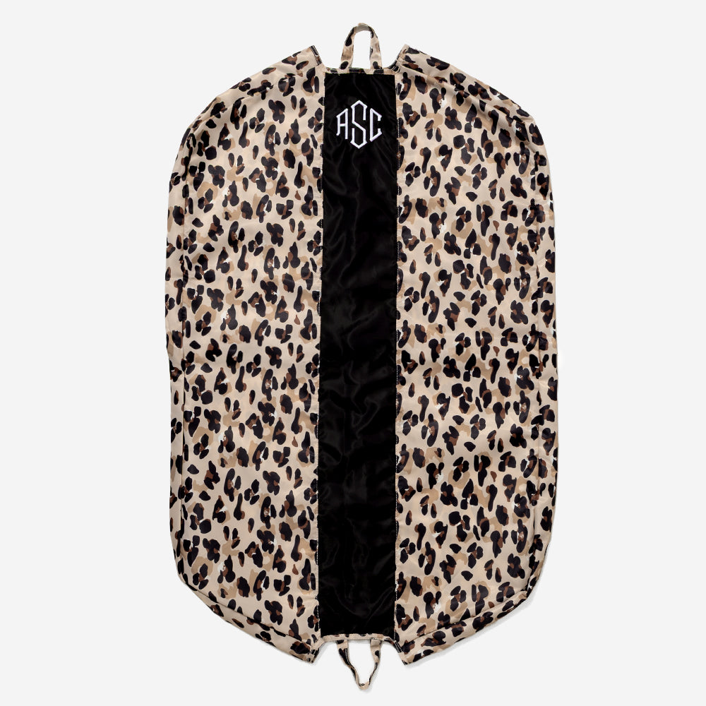 monogrammed packable garment bag in black classic cheetah