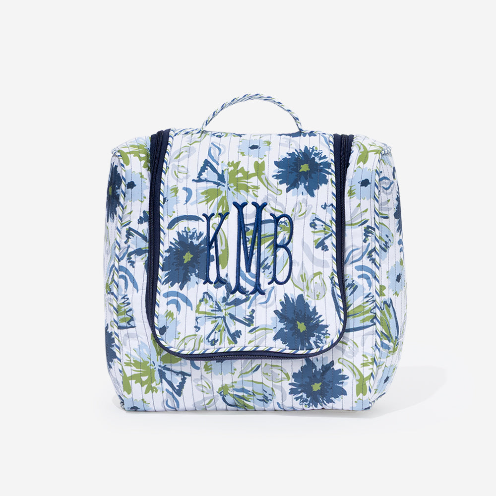 monogrammed quilted hanging toiletry bag in indigo painted petals 