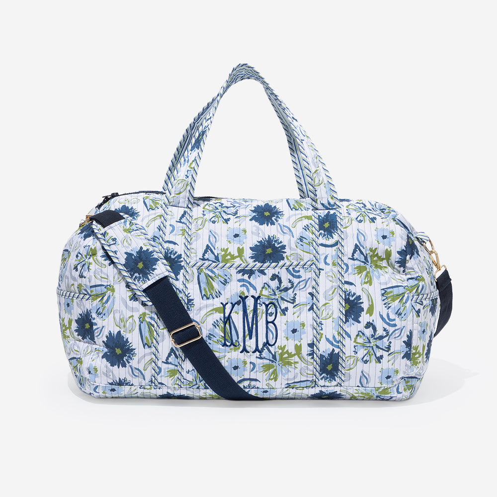 monogrammed quilted weekender in indigo painted petals 
