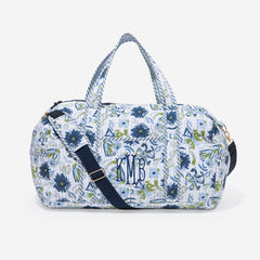 monogrammed quilted weekender in indigo painted petals 