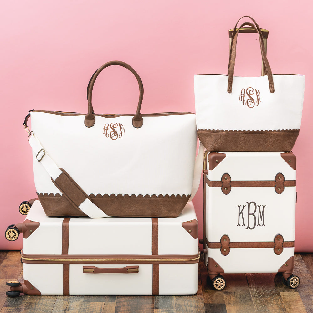 monogrammed scallop vintage weekender and tote in ivory on luggage