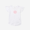 White t-shirt with pink monogram on a white background