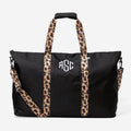 monogrammed weekend bag in black classic cheetah