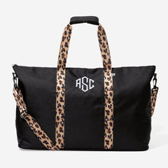 monogrammed weekend bag in black classic cheetah