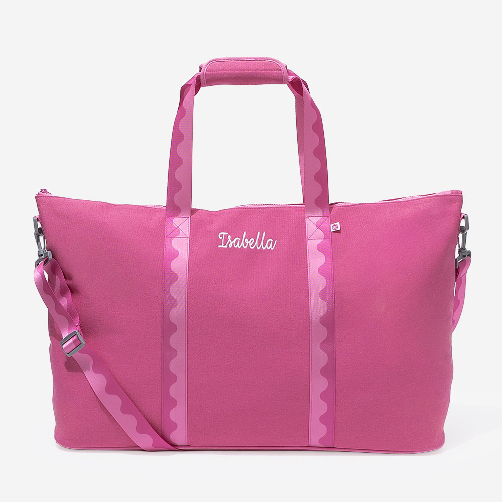 monogrammed weekend bag in pink punch