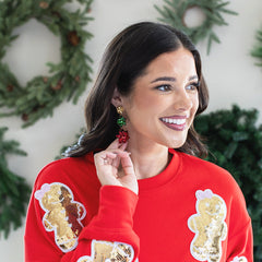 multi gift bow earrings on peyton