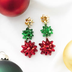 multi gift bow earrings on white with ornaments