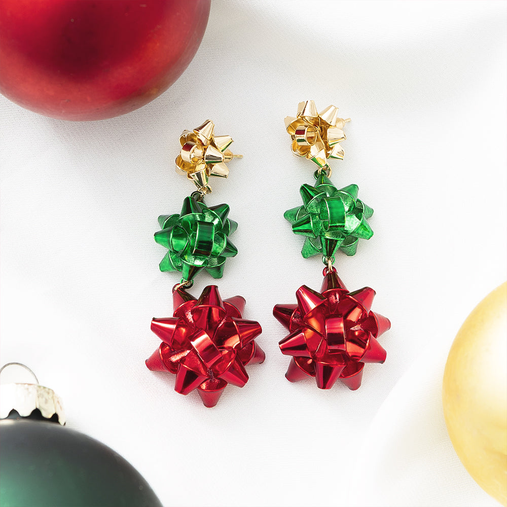 multi gift bow earrings on white with ornaments