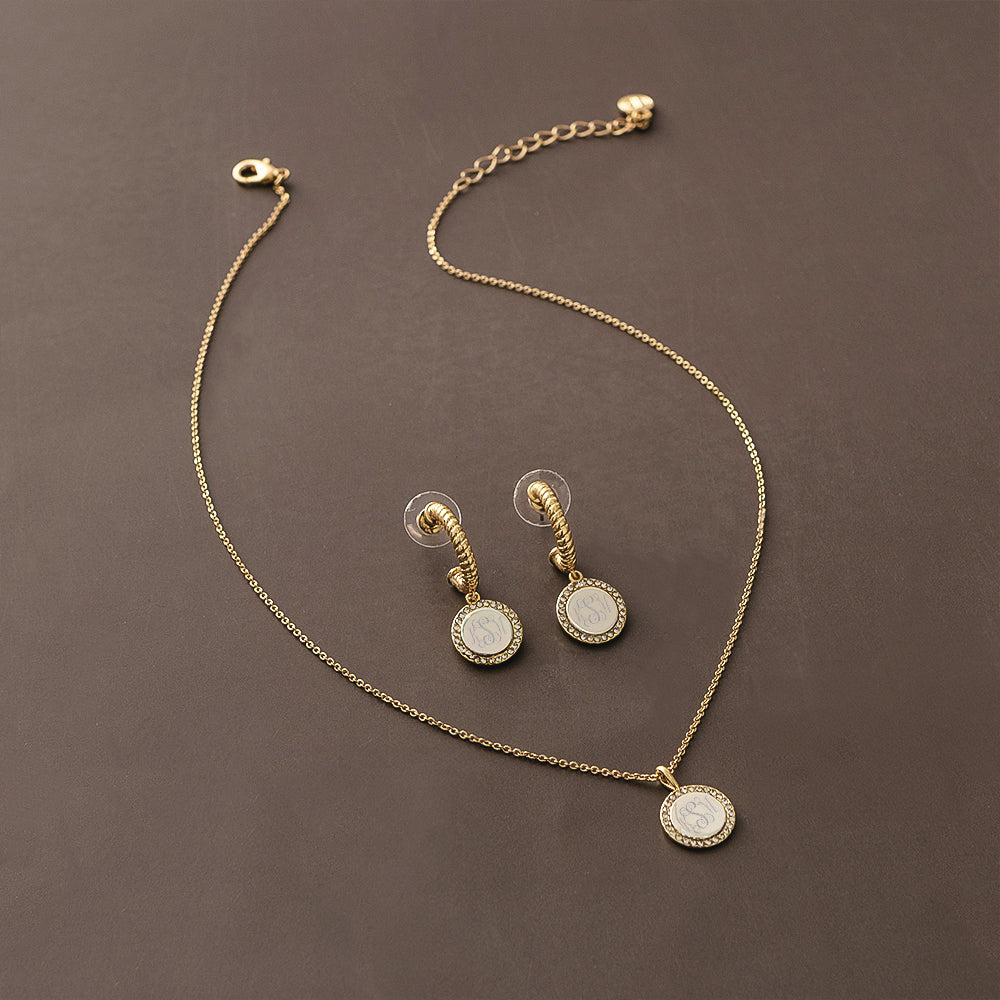 pave cable necklace and earrings on brown