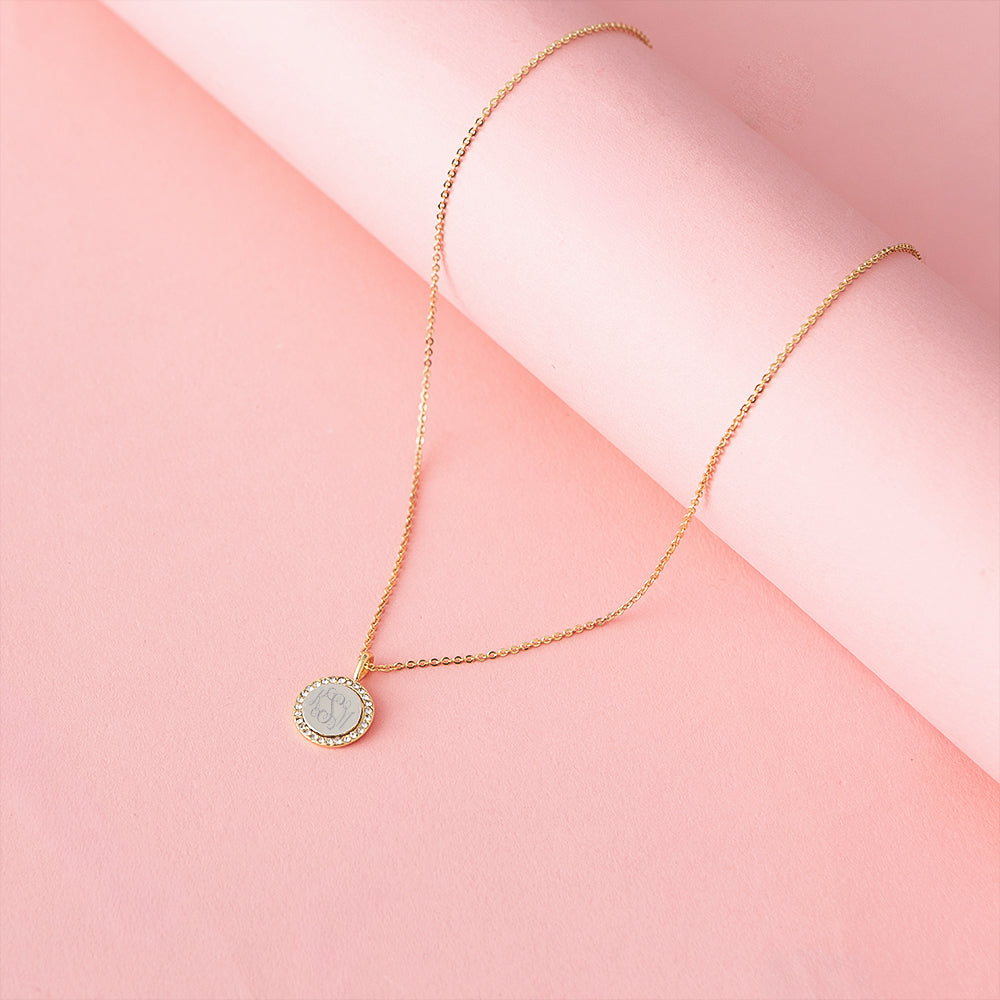 pave cable necklace on pink