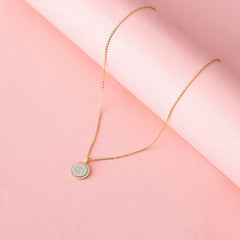 pave cable necklace on pink