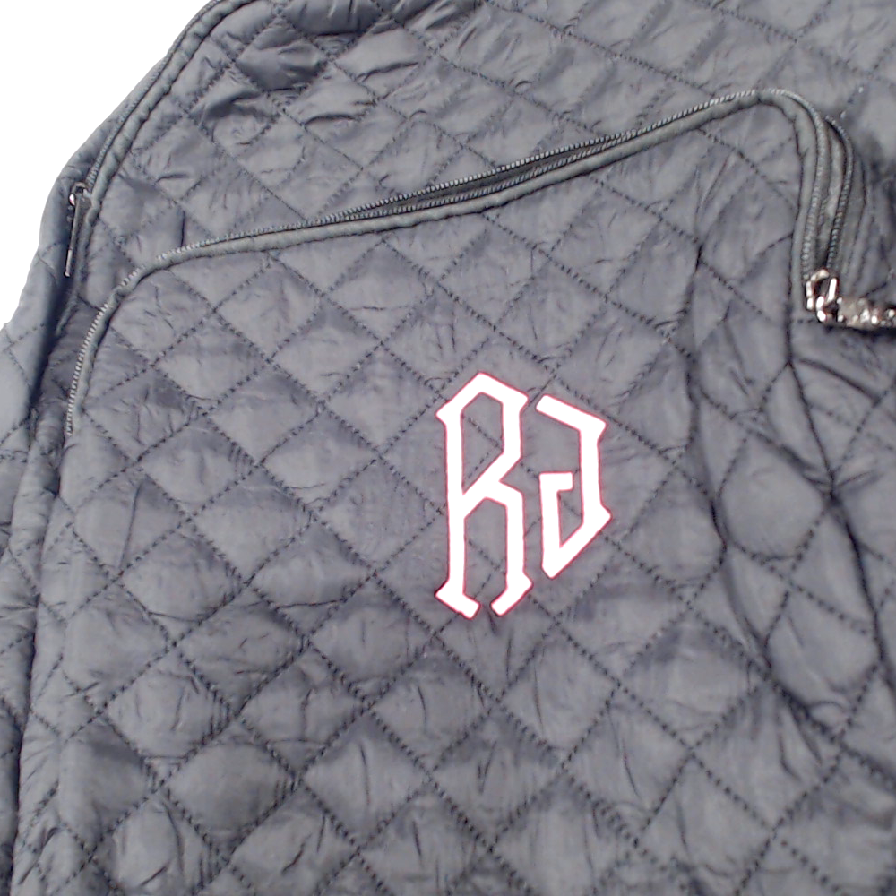 BLOOPER BAG: Monogrammed Quilted Laptop Backpack