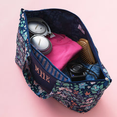 navy floral trellis packable duffel bag open shot