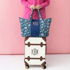 navy floral trellis packable weekend duffel bag with suitcase