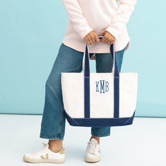 navy personalized tote bag in hands