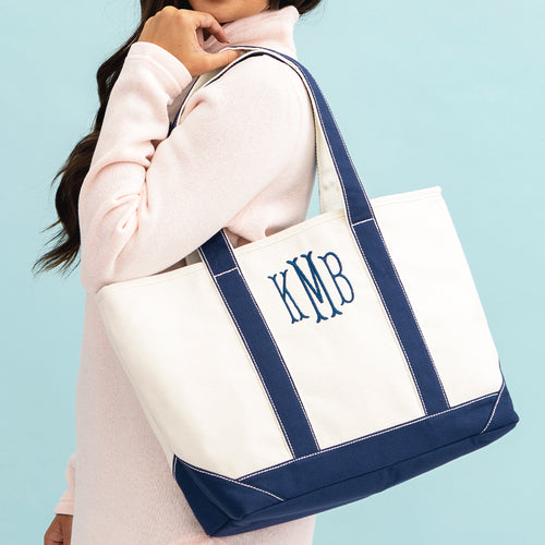 navy personalized tote bag on shoulder