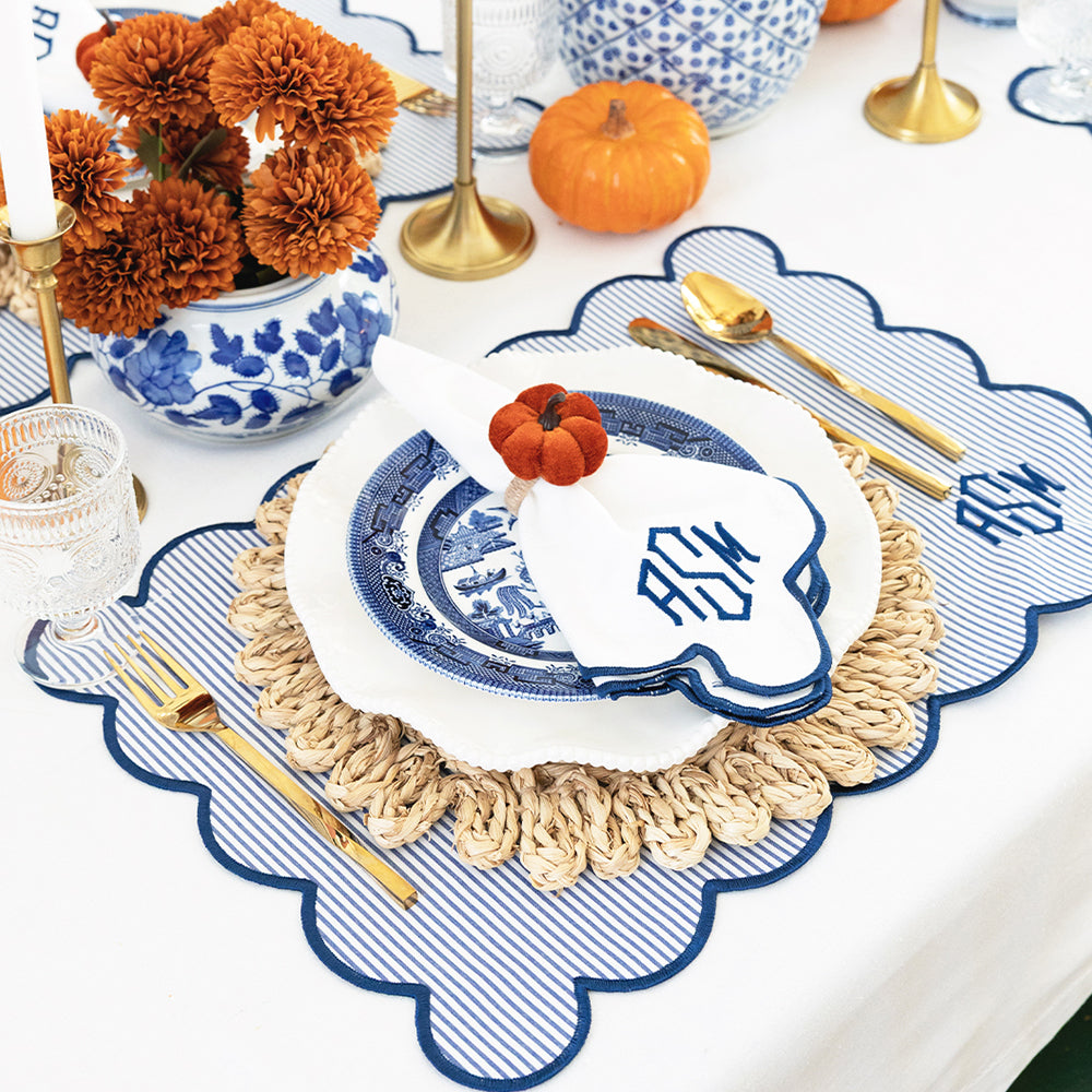 navy scalloped napkin with fall decor
