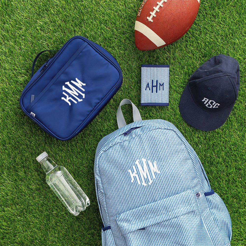 Navy seersucker kids basic backpack flatlay