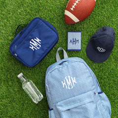 Navy seersucker kids basic backpack flatlay