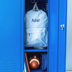 Navy seersucker kids basic backpack in locker