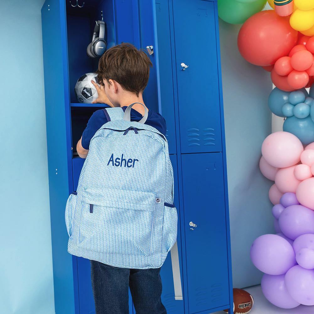 Navy seersucker kids basic backpack on back