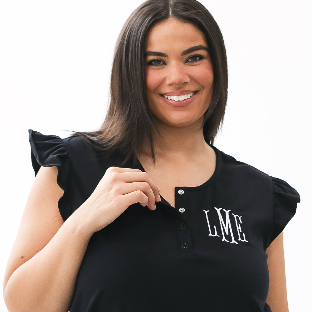 close up of black ruffle monogrammed sleep set