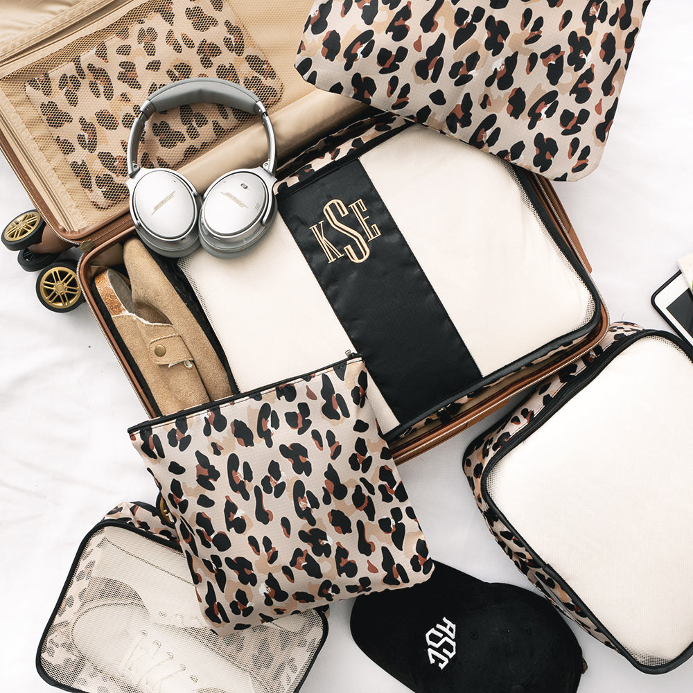 classic cheetah packing bag set in suitcase
