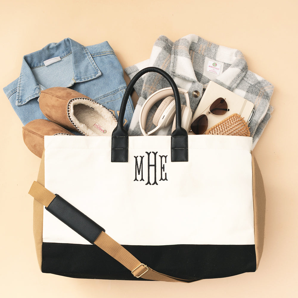 monogrammed ivory upscale weekender packed