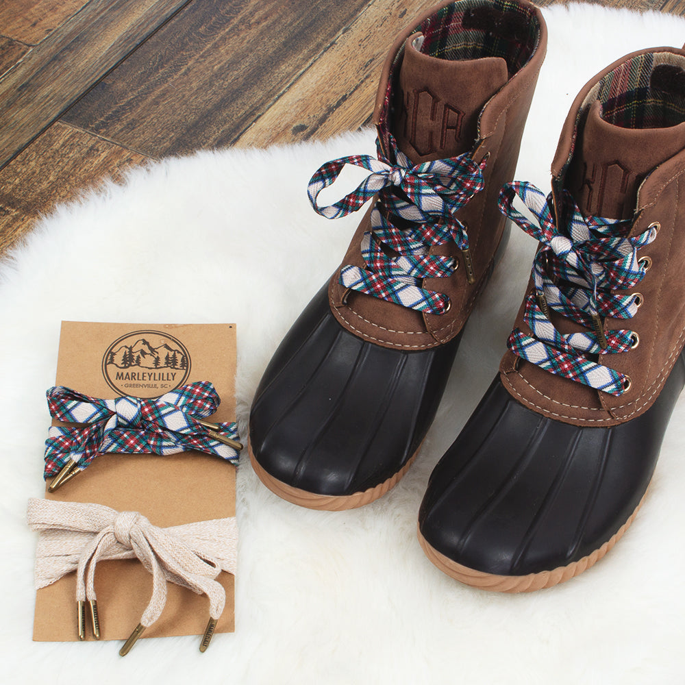 camel plaid shoelaces on monogrammed brown duck boots