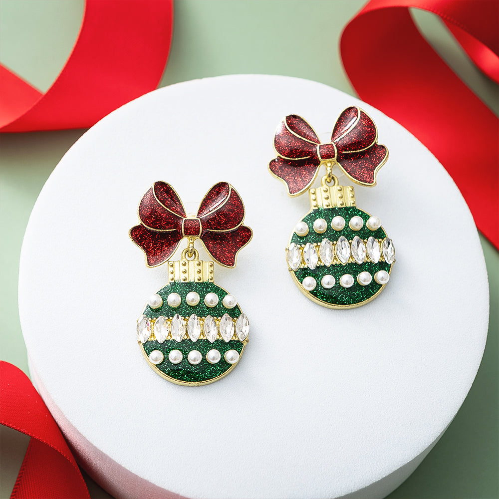 ornament christmas earrings on tray with ribbon