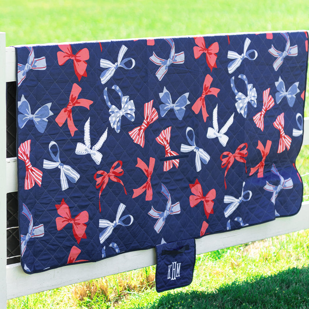 patriotic bows picnic blanket on fence