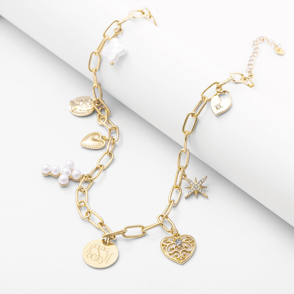 pearl signature charm necklace on white roll