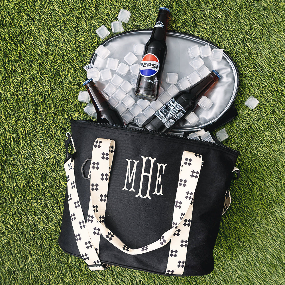 personalized cooler in black ditsy diamond on turf with drinks