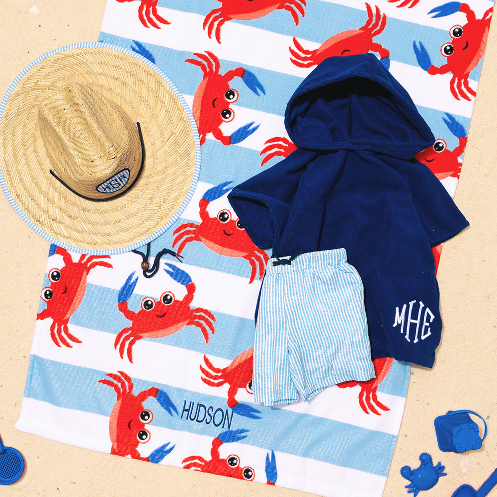 blue striped kids towel with crab design and embroidered monogram