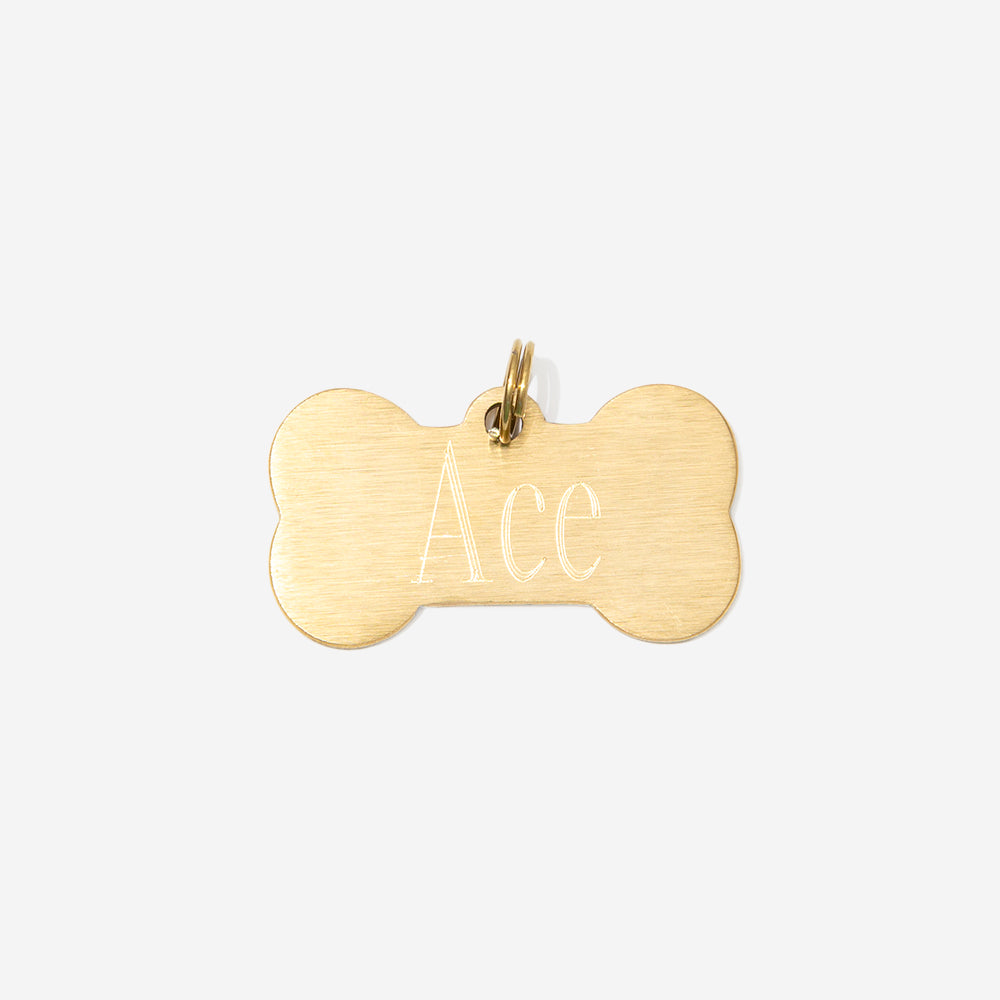 personalized dog tag in gold