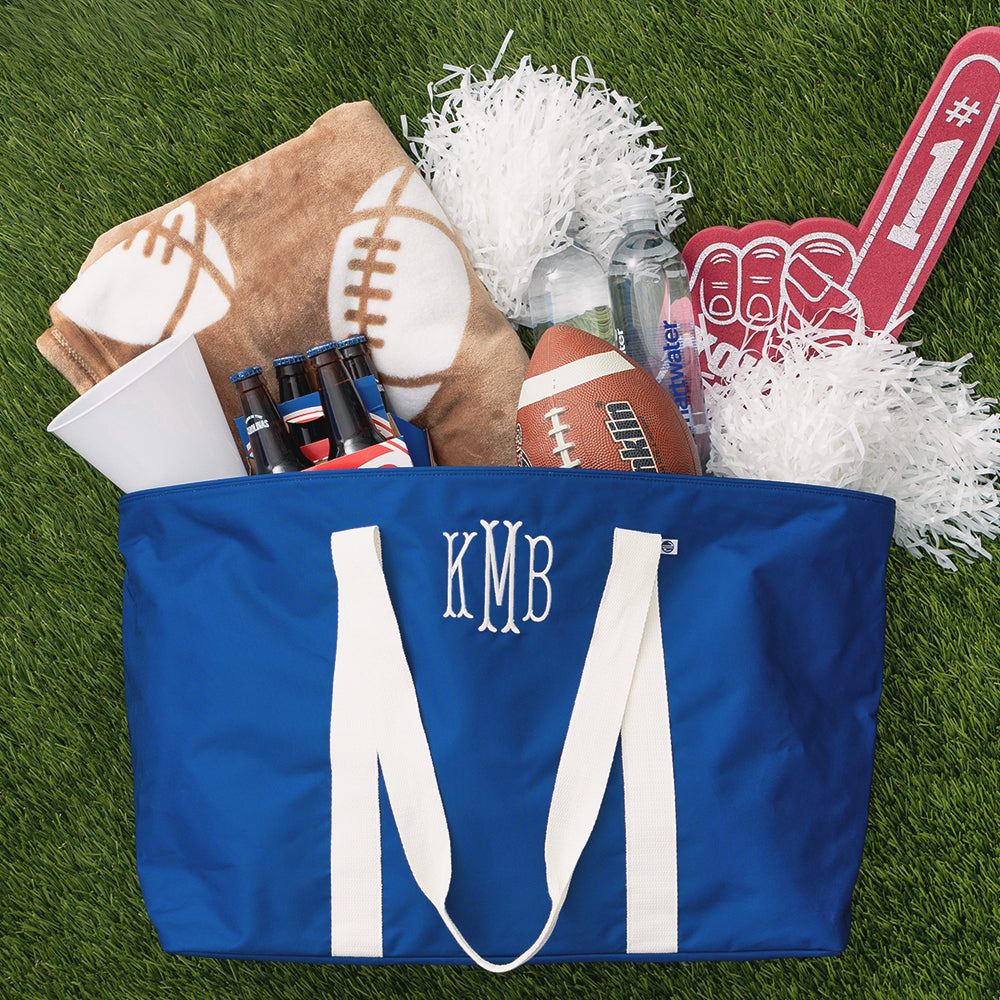personalized extra large tote bag in blue packed for football tailgate 