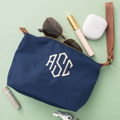 personalized lightweight wristlet in navy with accessories 
