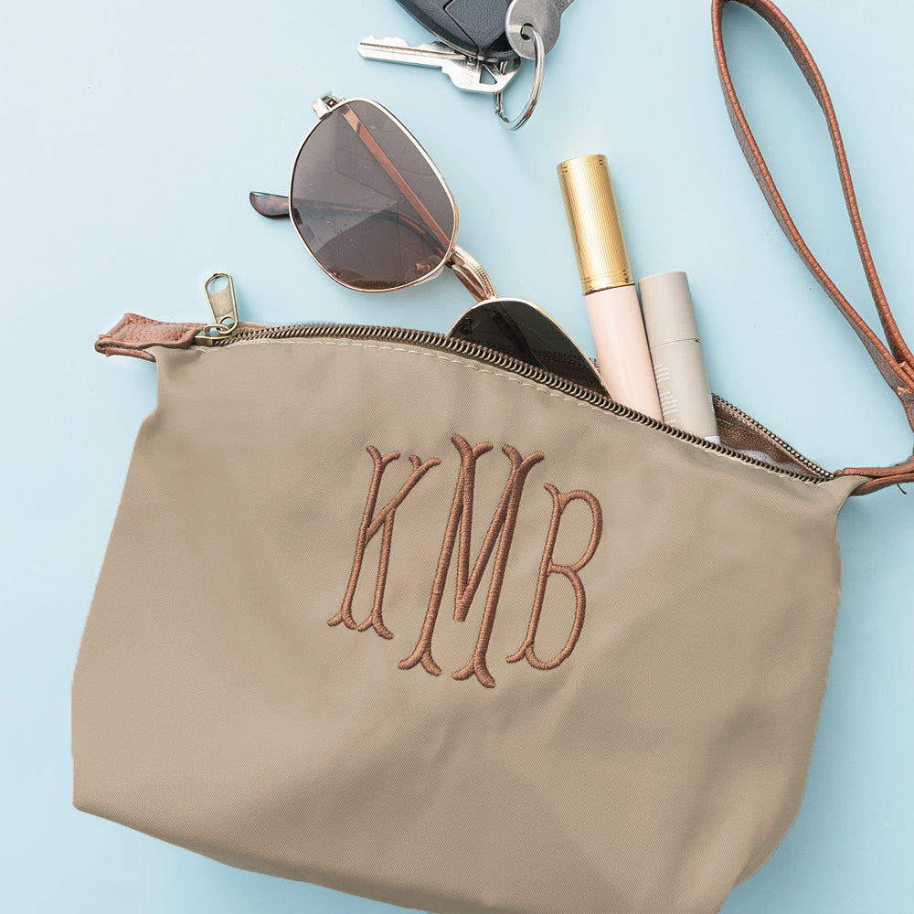 personalized lightweight wristlet in tan with accessories 