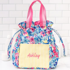 cosmetic pouch with watercolor floral print and yellow stripes