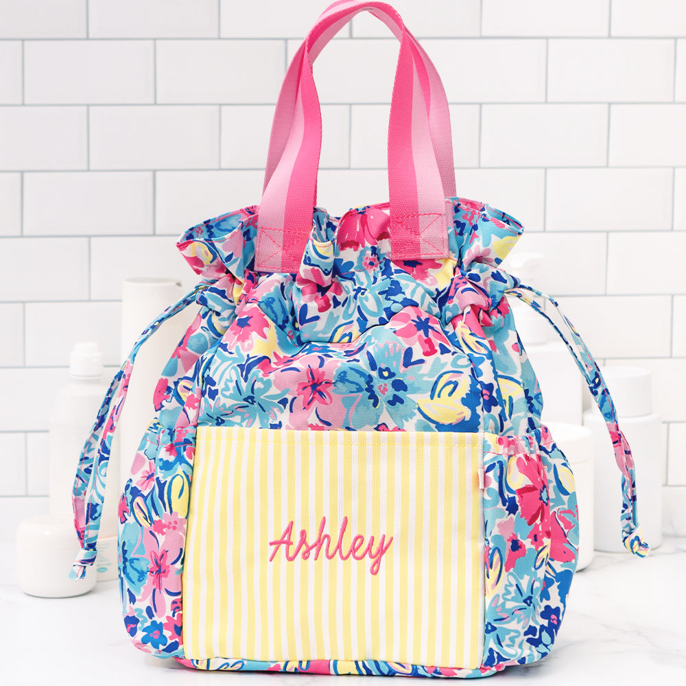 cosmetic pouch with watercolor floral print and yellow stripes