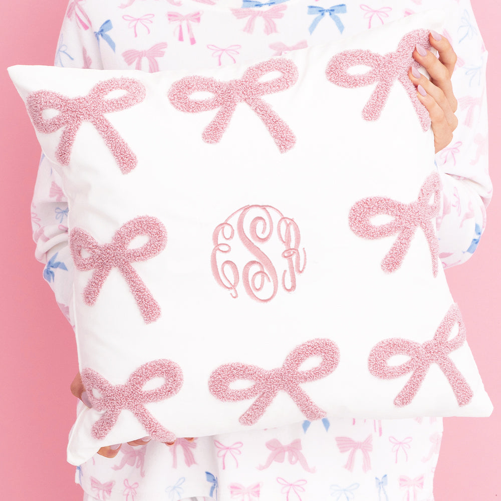 pink bows bow pillow sham in hands