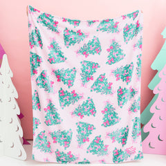 pink christmas trees blanket held up