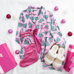 pink christmas trees softspun pajamas flatlay with stocking