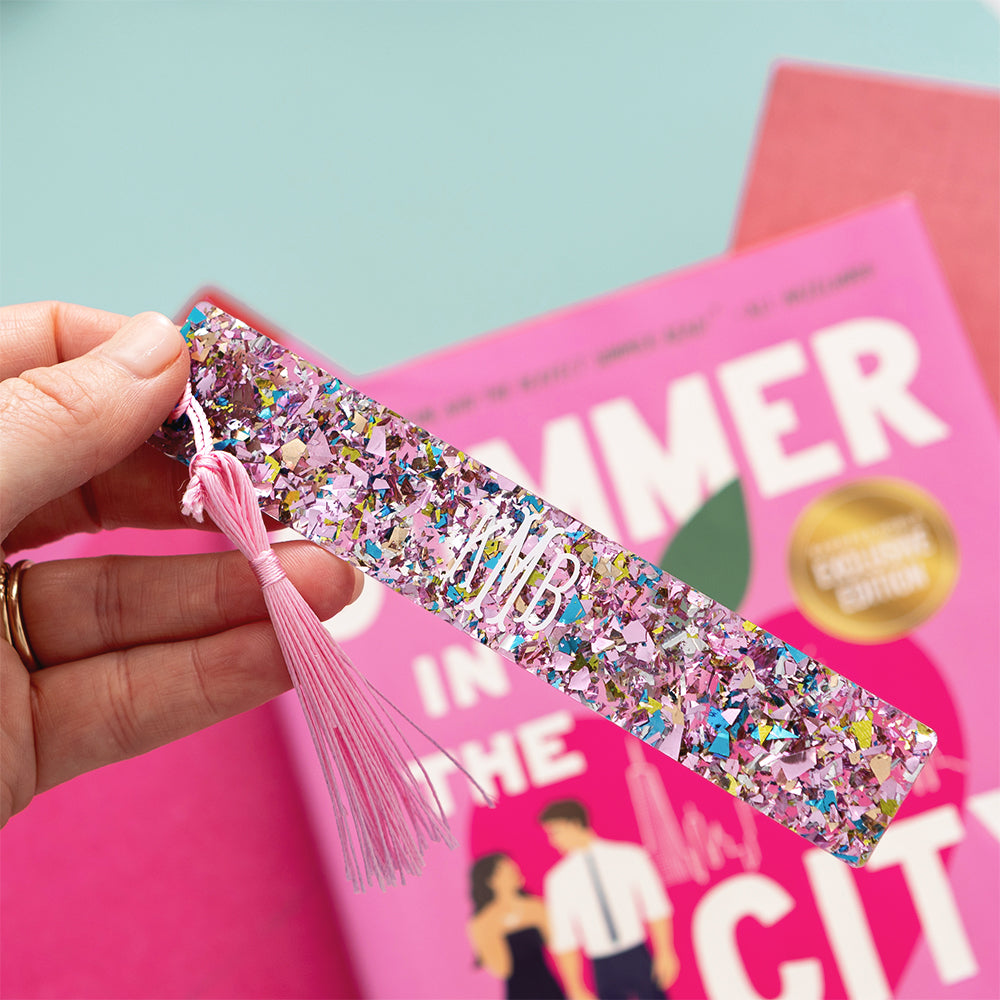 pink glitter bookmark in hand