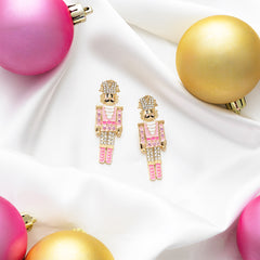 pink gold nutcracker earrings with ornaments